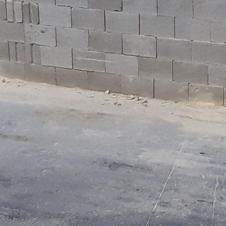 Some workers brought some stones to build with and leave a mess in front of my house. I report it with the local council many times to come and clean the street but no one came. 